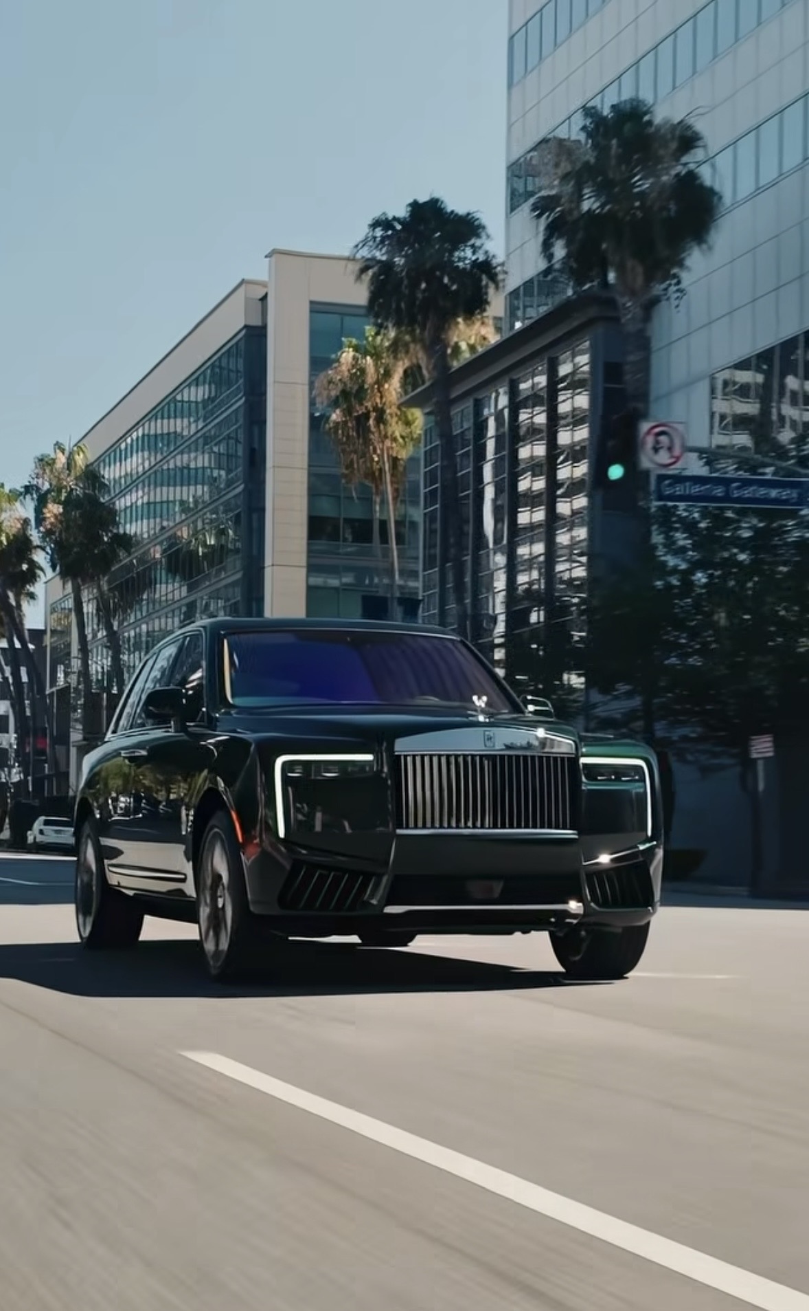 Luxury motorcar on a city boulevard